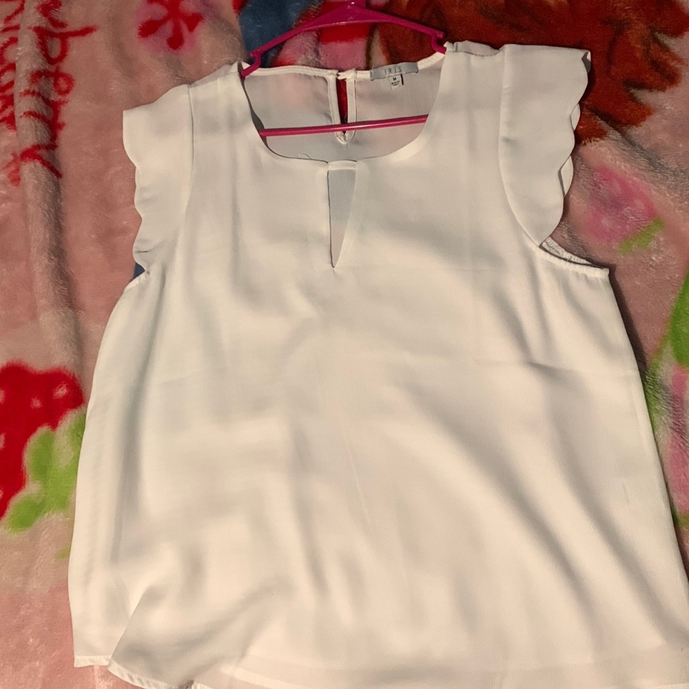 White sleeveless blouse